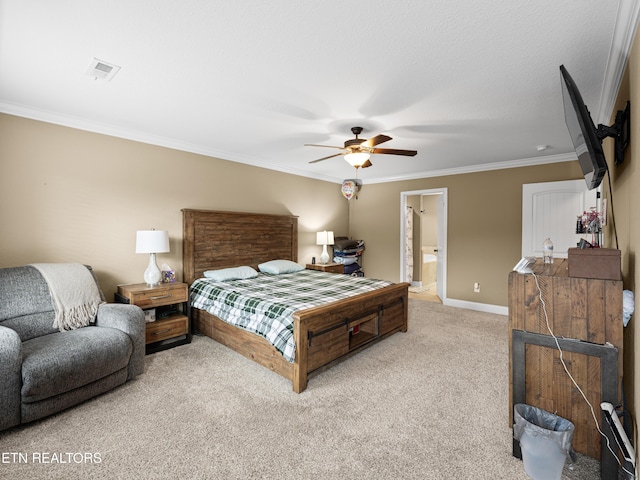 bedroom featuring light carpet, ensuite bath, ceiling fan, ornamental molding, and a textured ceiling