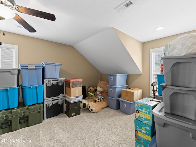 storage area featuring ceiling fan