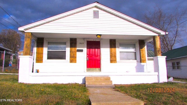 bungalow-style home with covered porch