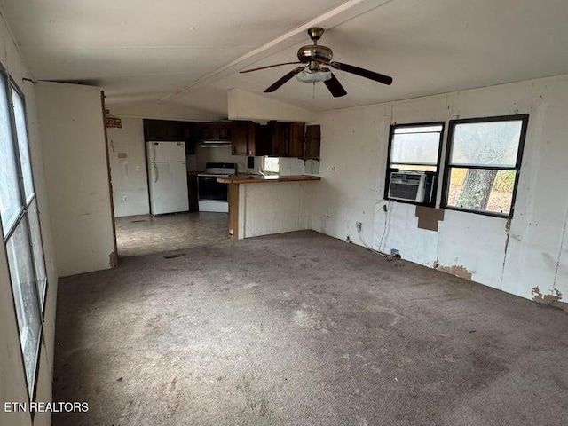 unfurnished living room featuring ceiling fan, cooling unit, and lofted ceiling