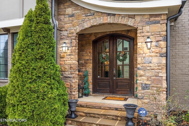 view of exterior entry with french doors