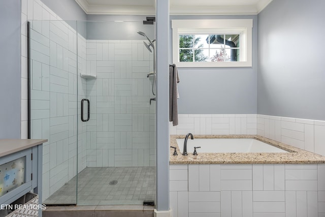 bathroom with separate shower and tub and crown molding