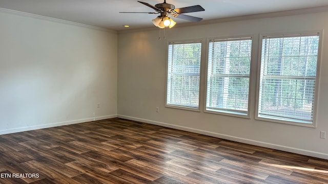 unfurnished room with dark hardwood / wood-style flooring, ceiling fan, and crown molding