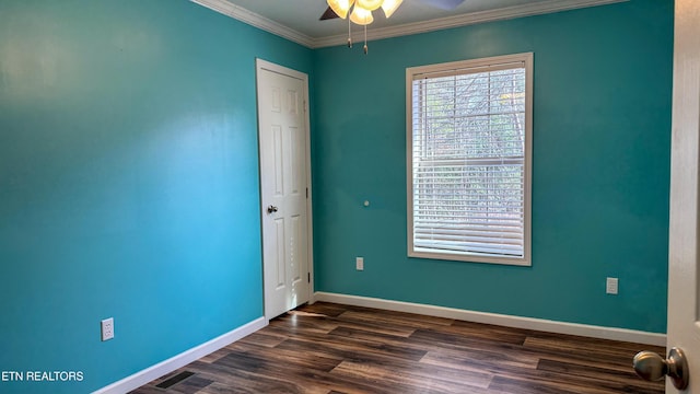 unfurnished room featuring ornamental molding, dark wood-type flooring, and ceiling fan