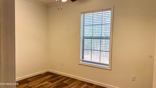 unfurnished room with ceiling fan, ornamental molding, dark hardwood / wood-style floors, and plenty of natural light