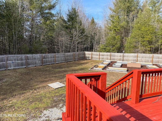 view of yard with a wooden deck