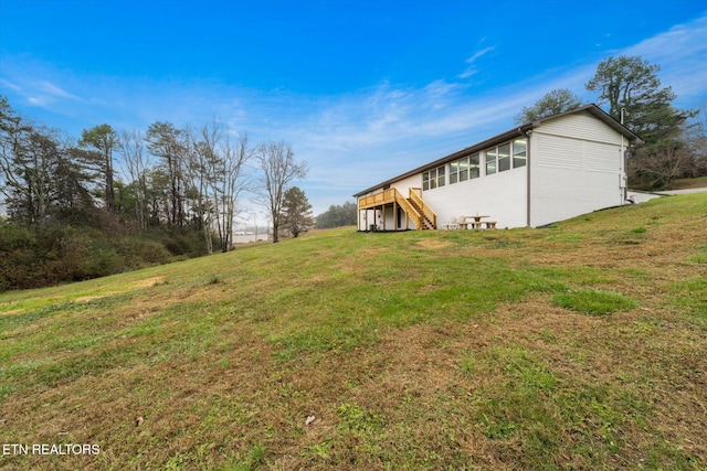 view of yard featuring a deck