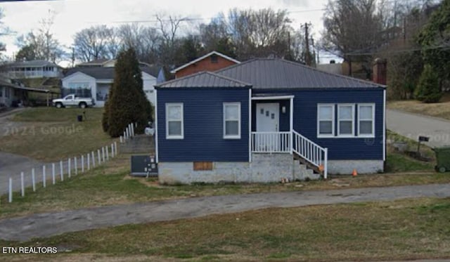 bungalow-style house with central AC