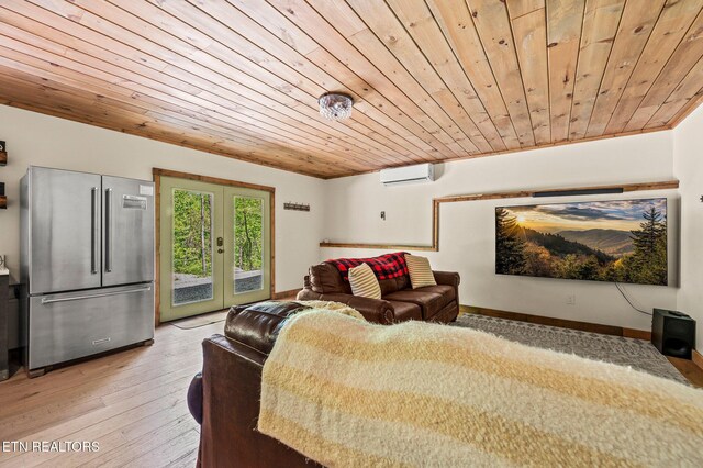 3719 Clabo Mountain Ln, Sevierville, TN 37862 - living room with wood ceiling, a wall unit AC, light wood-style floors, and french doors
