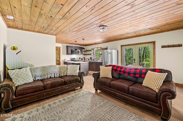 3719 Clabo Mountain Ln, Sevierville, TN 37862 - living area with wood ceiling, light wood-style flooring, and french doors