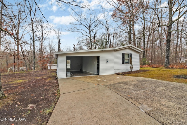 garage featuring a carport