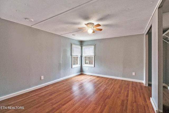 unfurnished bedroom with hardwood / wood-style floors and ceiling fan