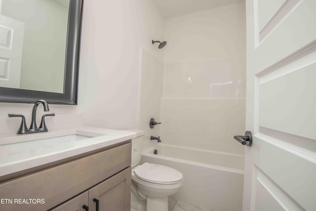 full bathroom featuring shower / tub combination, vanity, and toilet