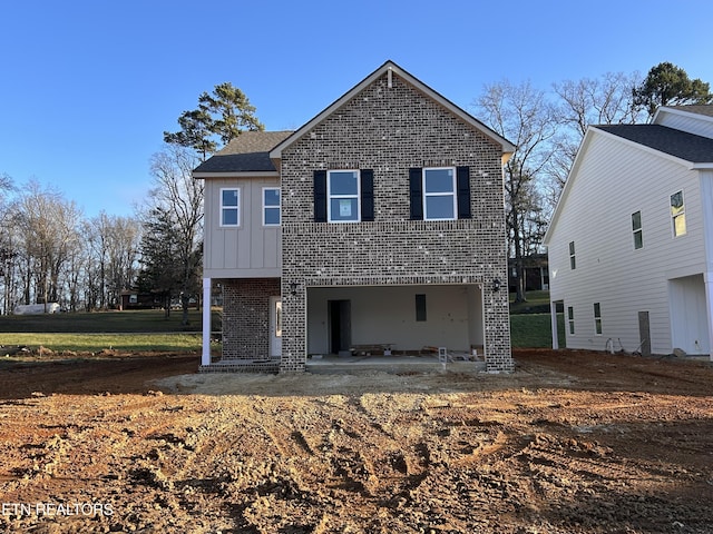 rear view of house with a patio area