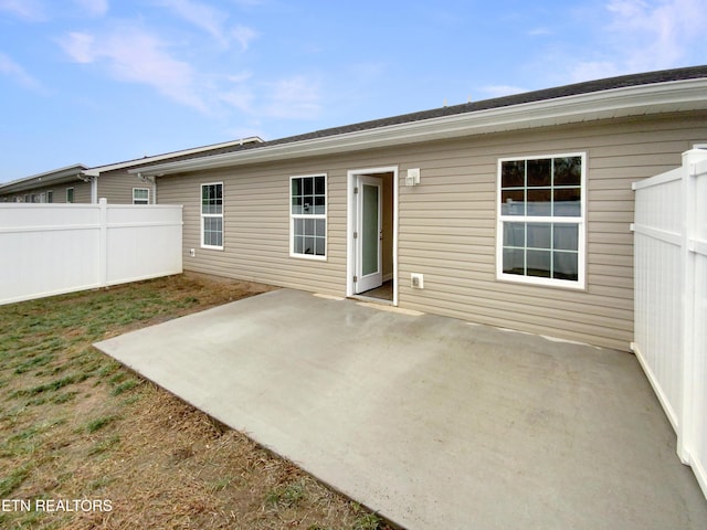 rear view of house with a patio