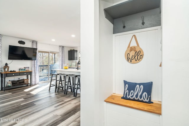 mudroom with hardwood / wood-style floors