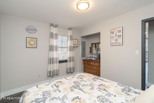 bedroom with wood-type flooring