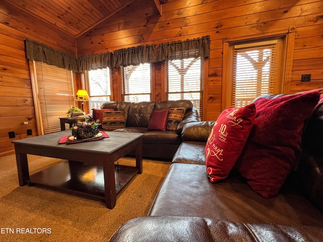 carpeted living room with wood ceiling, lofted ceiling, and wooden walls