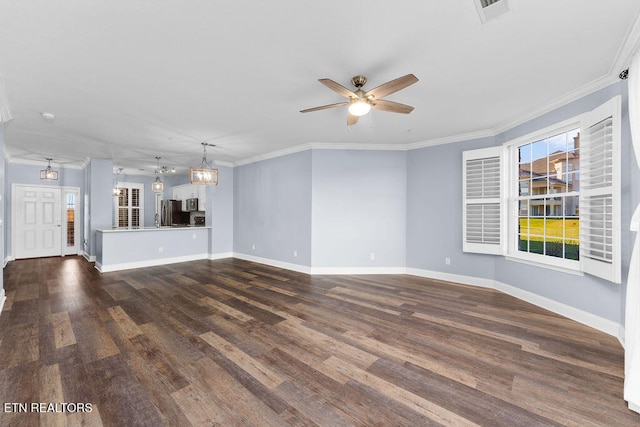 unfurnished living room with crown molding, ceiling fan, and dark hardwood / wood-style floors