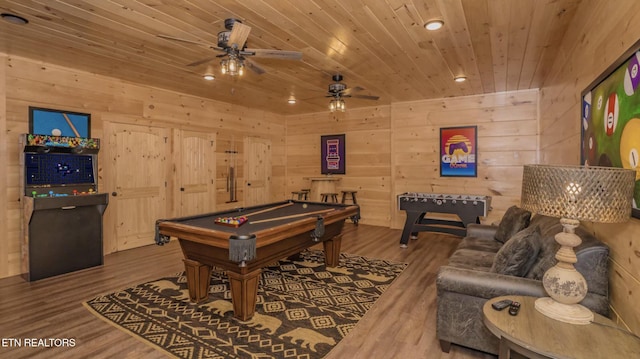 game room featuring hardwood / wood-style flooring, wood walls, wood ceiling, and billiards