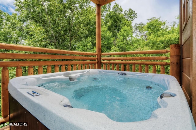 deck with a hot tub