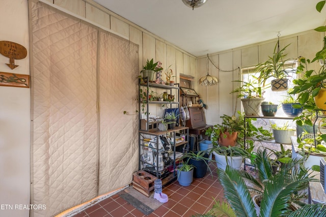 misc room featuring dark tile patterned floors