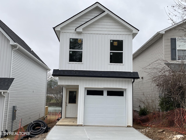 view of front of property featuring a garage