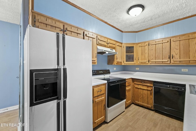 kitchen with a textured ceiling, crown molding, white appliances, and light wood-type flooring