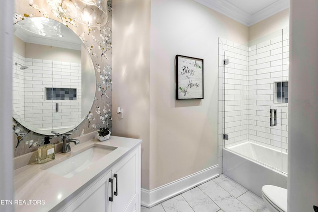 full bathroom featuring crown molding, vanity, tiled shower / bath combo, and toilet