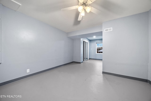 unfurnished room with ceiling fan