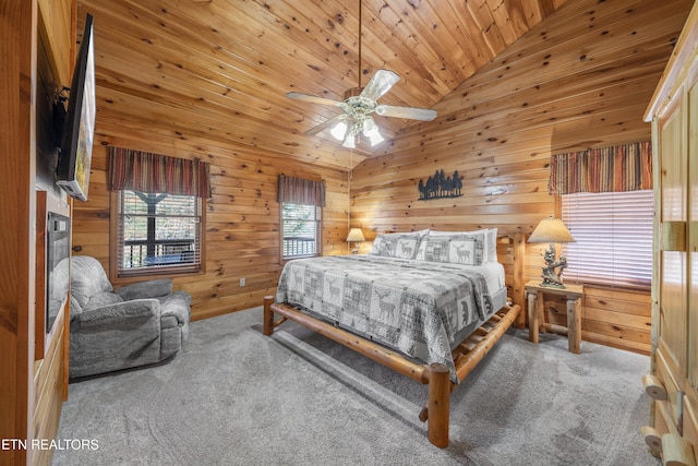 carpeted bedroom with wooden walls, ceiling fan, wood ceiling, and high vaulted ceiling