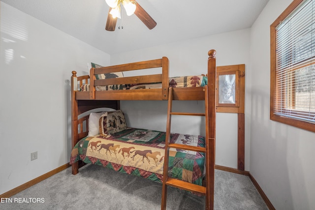 bedroom featuring ceiling fan and carpet floors