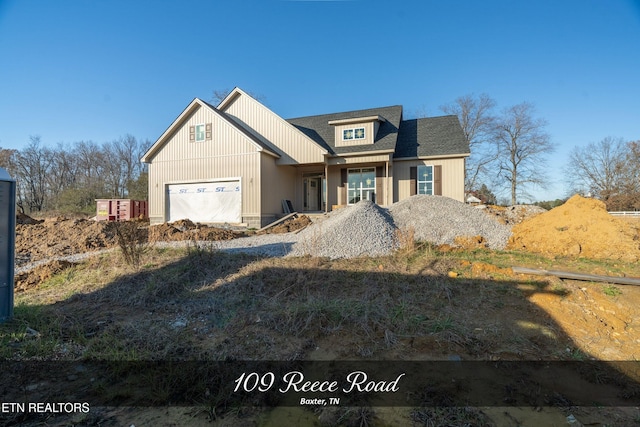 view of front of property featuring a garage