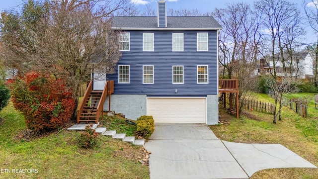 view of front of property with a garage