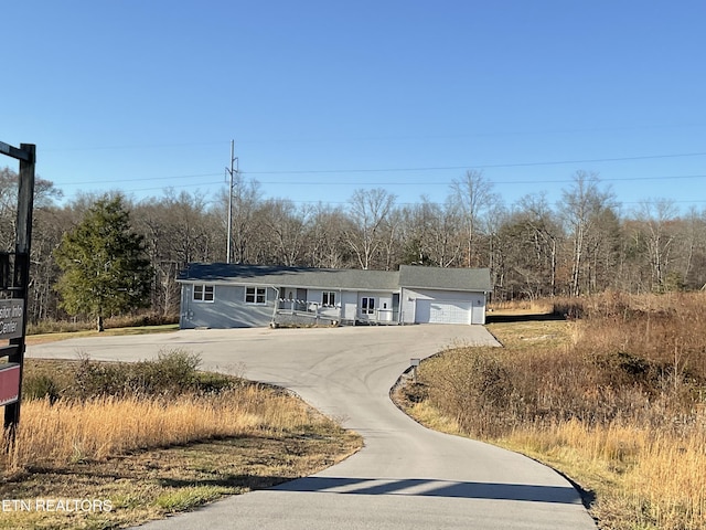 view of front of property featuring a garage