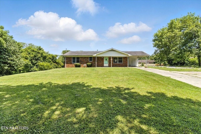 505 S S 38th St, Middlesboro, KY 40965 - ranch-style house featuring driveway, a carport, a front lawn, and brick siding