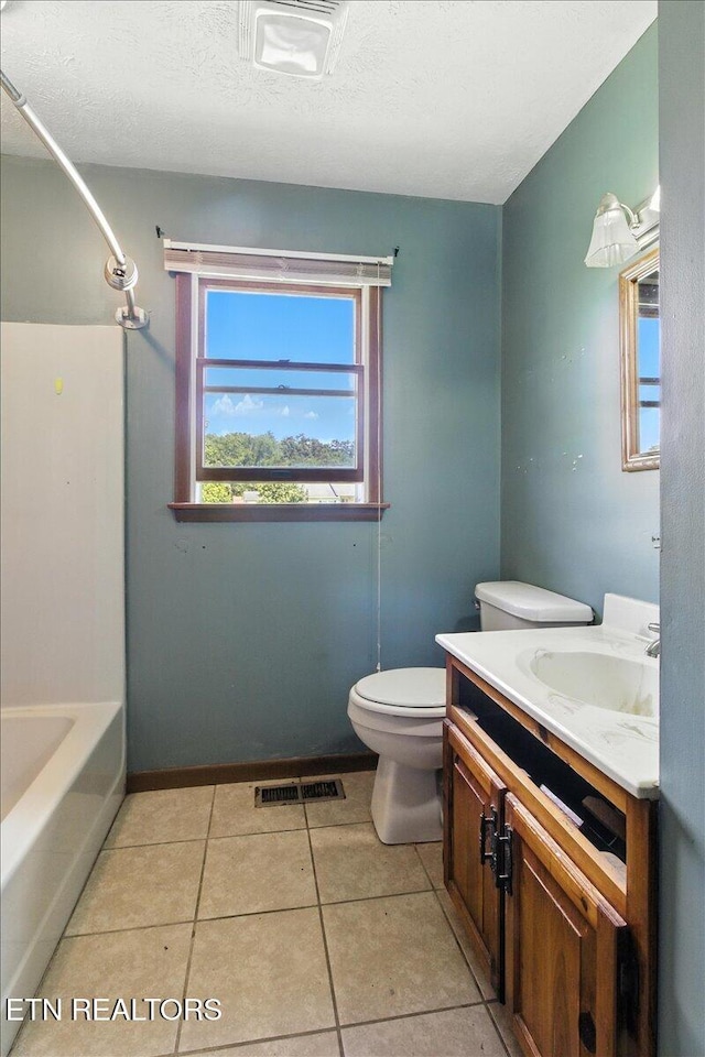 505 S S 38th St, Middlesboro, KY 40965 - full bath featuring vanity, tile patterned floors, and bathing tub / shower combination