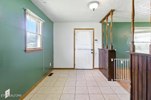 505 S S 38th St, Middlesboro, KY 40965 - tiled entrance foyer with baseboards and a textured ceiling