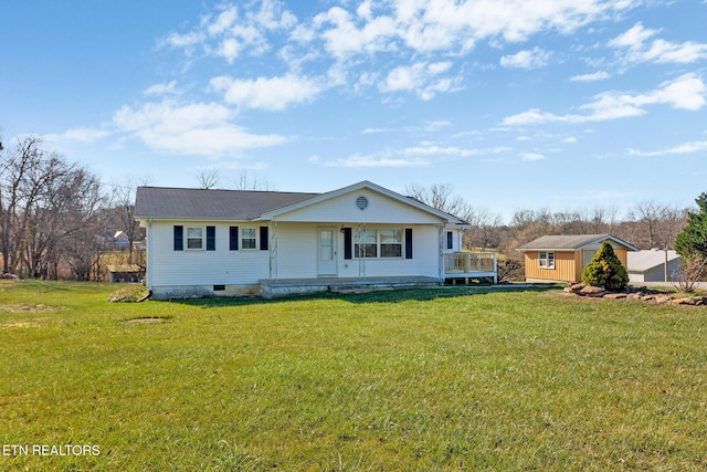 ranch-style house with a porch, a shed, and a front yard