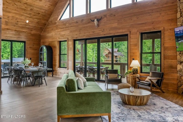 sunroom with wooden ceiling and lofted ceiling