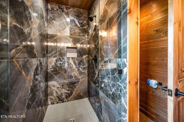 bathroom with tiled shower