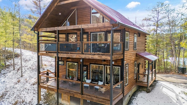 view of snow covered house