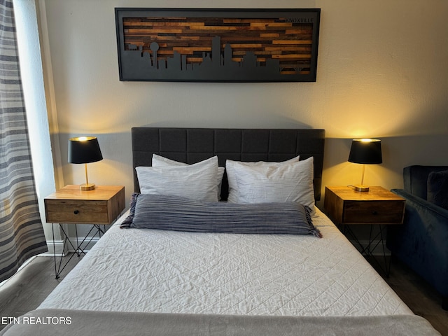 bedroom featuring hardwood / wood-style flooring