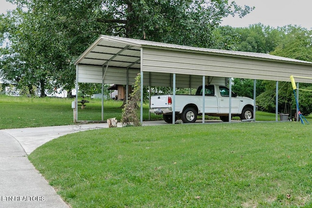 view of car parking with a carport and a yard