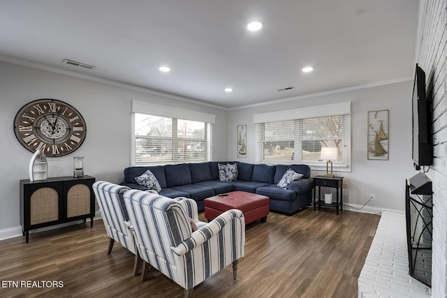 living room with dark wood-type flooring and crown molding