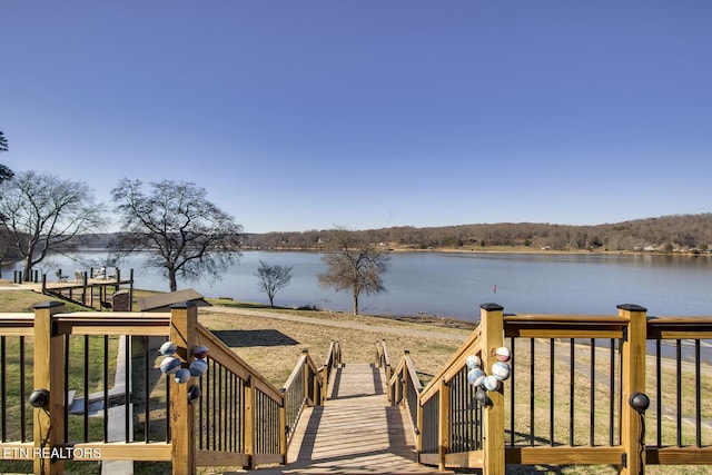 dock area featuring a water view