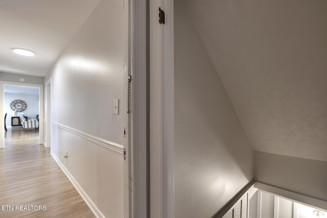 corridor featuring light hardwood / wood-style floors