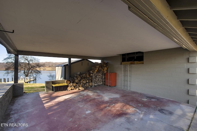 view of patio / terrace with a water view