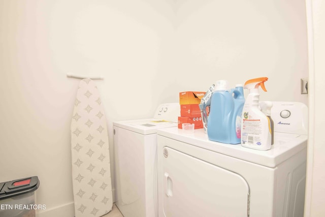 laundry room with washer and dryer