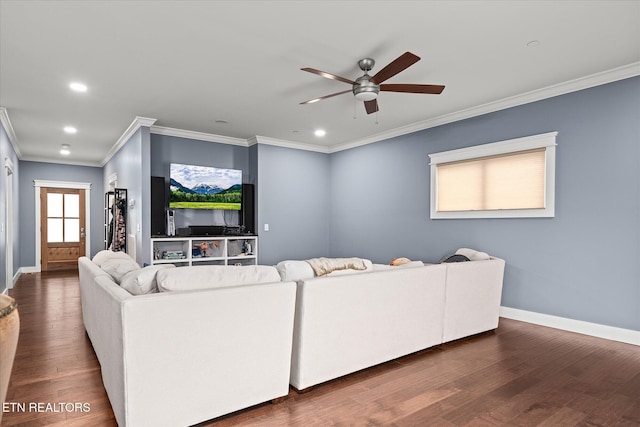 living room with dark hardwood / wood-style floors, ceiling fan, and ornamental molding